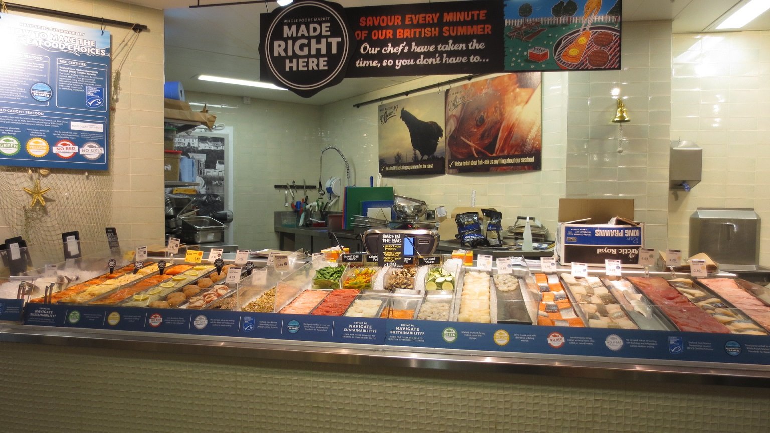 A Display of Ready To Bake Seafood Dinners at a Whole Foods Market